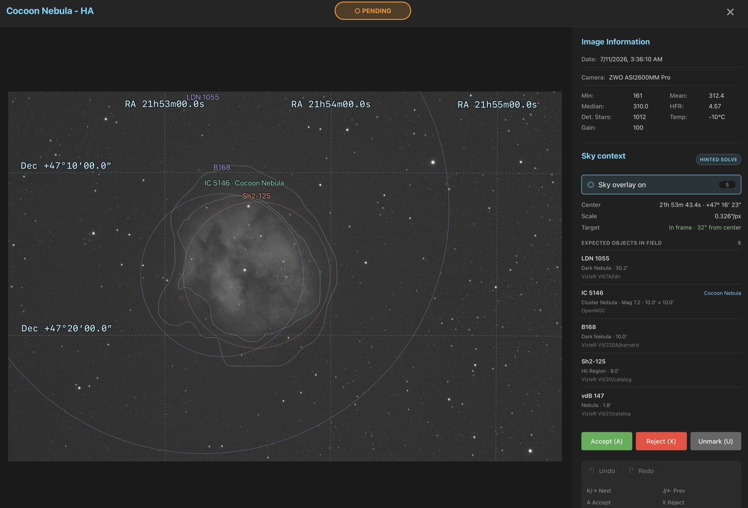 A Seiza-solved Cocoon Nebula frame with coordinate grid, catalog labels, object outlines, and target offset
